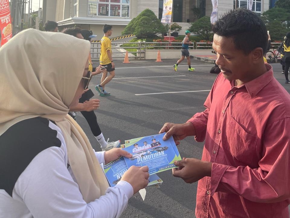 UPTD Samsat Bandar Lampung Sosialisasikan Pemutihan Pajak di Bhayangkara Run